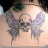 Poze Poze Tatuaje. Modele de Tatuaje (foto) - Craniu cu aripi pe spate