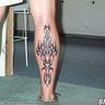 Poze Poze Tatuaje. Modele de Tatuaje (foto) - Tribal mare pe picior